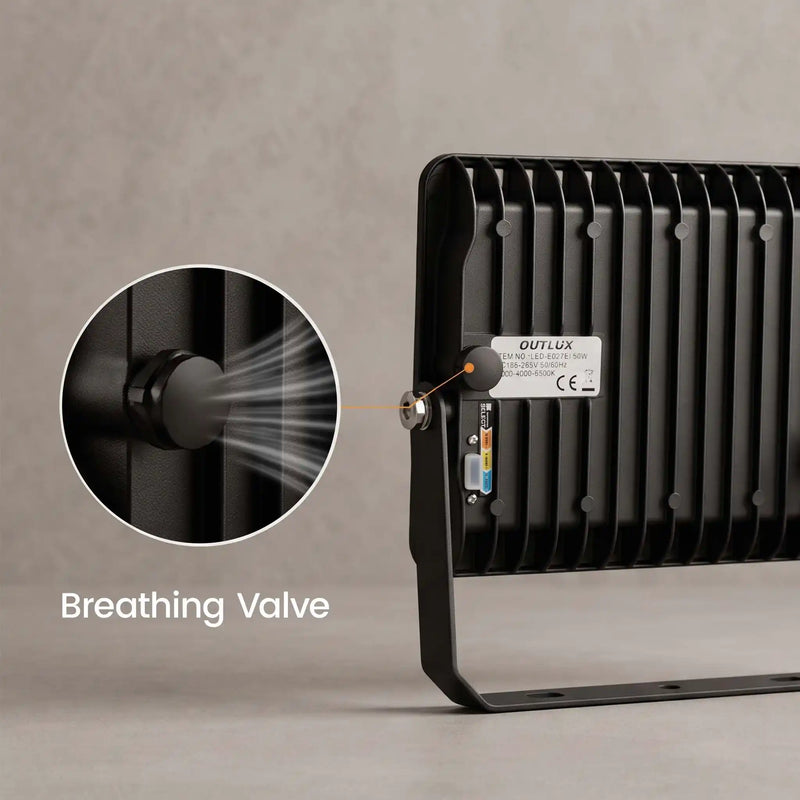 Black outdoor LED light bar with a circular inset showing a breathing valve, on a textured gray background.