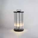 Portable solar garden lantern with stainless steel build and warm LED glow.