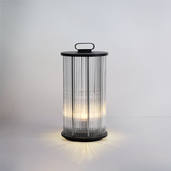 Portable solar garden lantern with stainless steel build and warm LED glow.