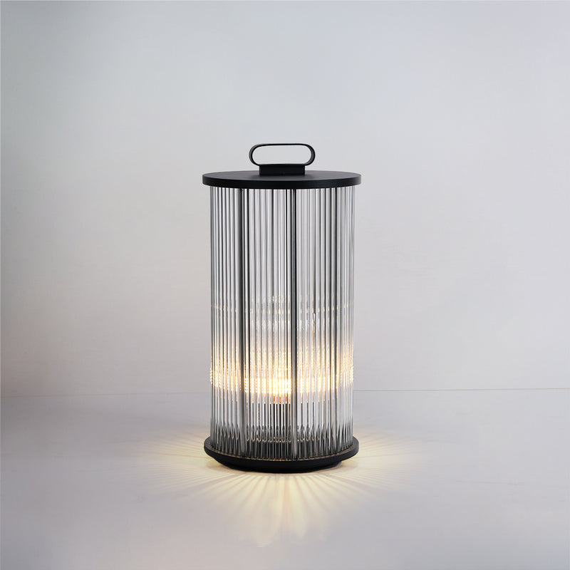 Portable solar garden lantern with stainless steel build and warm LED glow.