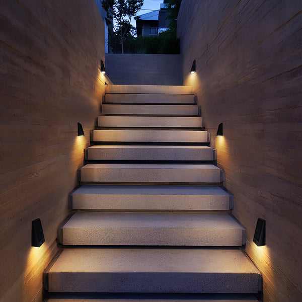 Modern solar garden wall lamp with automatic brightness adjustment. Great for lighting up walkways.