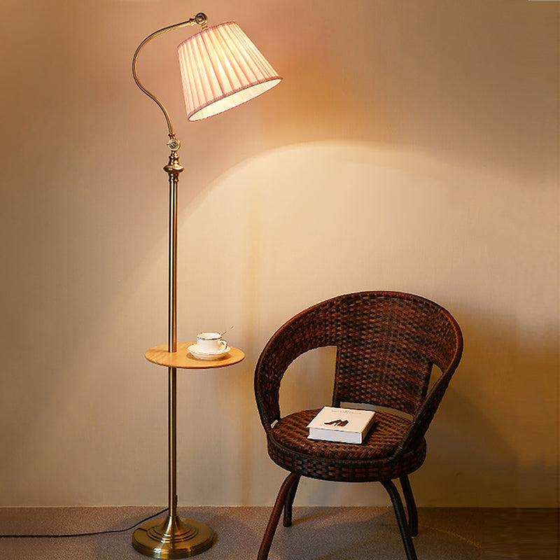 Sturdy gold lamp stand with non-slip pads.