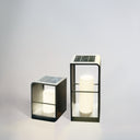 Solar garden light requiring no wiring, perfect for pathways and patios.